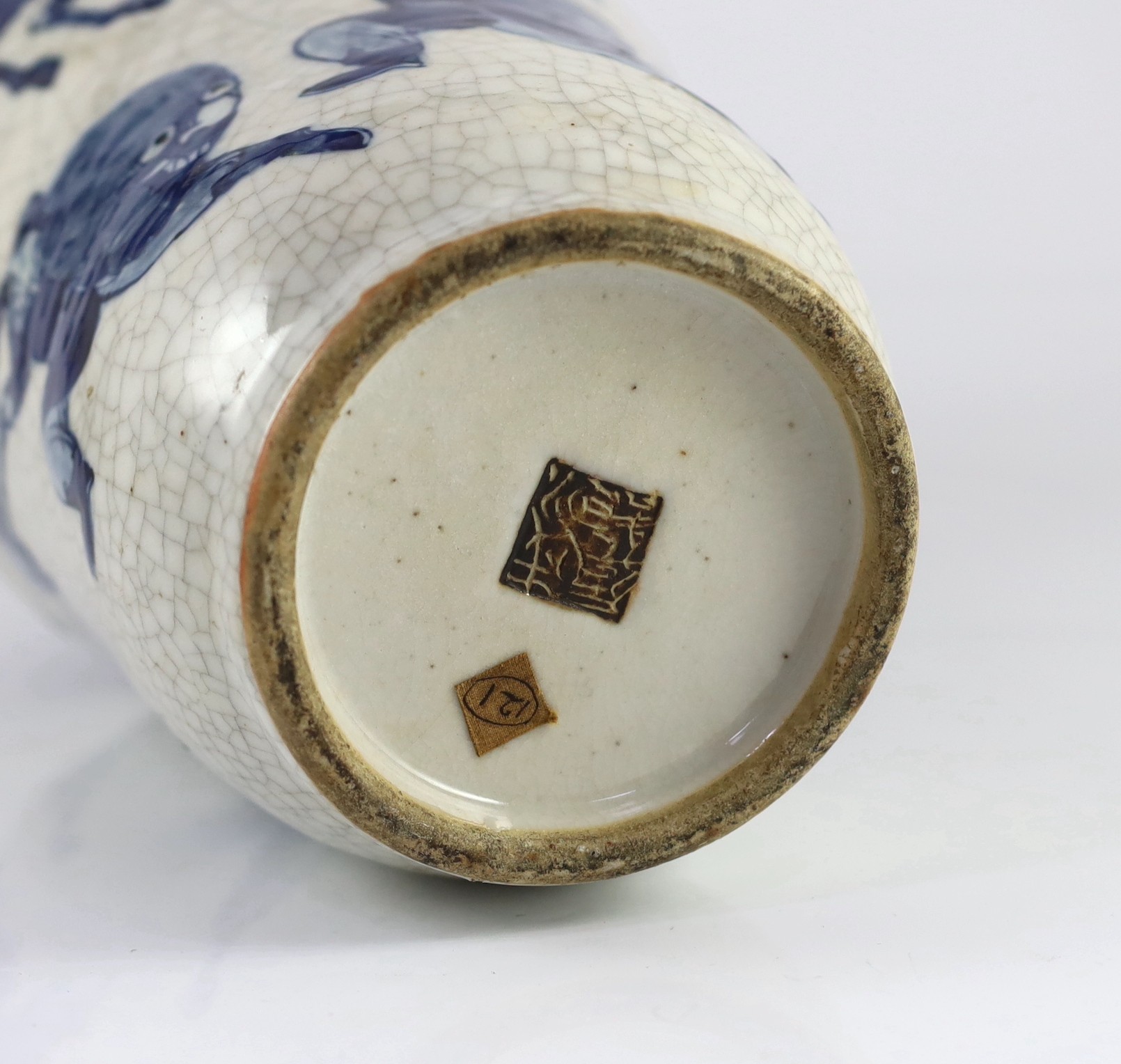 A Chinese blue and white crackle glaze ‘warriors’ vase, late 19th century, 35cm high, drilled hole